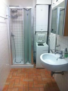 a bathroom with a shower and a sink at Villa Nunzia in Cupramontana