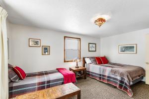 En eller flere senge i et værelse på Snowfall Getaway -268 I