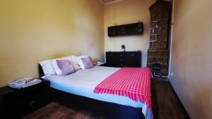 Ένα ή περισσότερα κρεβάτια σε δωμάτιο στο Apartment in the center +9 φωτογραφίες