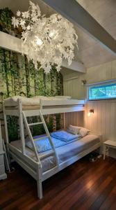 Ένα ή περισσότερα κρεβάτια σε δωμάτιο στο Gult Hus Ved Fjorden I Idylliske Holmsbu