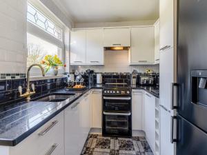 Køkken eller tekøkken på Bungalow Highfields