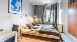 Posteľ alebo postele v izbe v ubytovaní Fenna Apartments 7 minut od Rynku