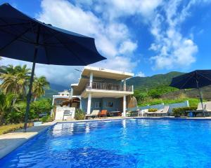 Bazén v ubytování Brisa Bliss nebo v jeho okolí