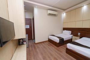 Μια τηλεόραση ή/και κέντρο ψυχαγωγίας στο Elite Grand City