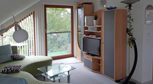 TV a/nebo společenská místnost v ubytování Haus Krönert