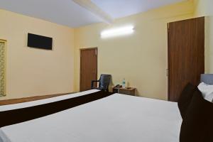 Postel nebo postele na pokoji v ubytování Hotel O Down Town Hotel