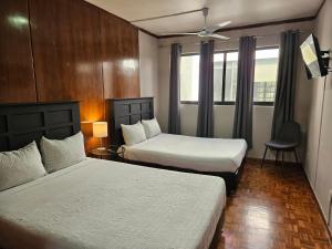 Un pat sau paturi într-o cameră la Singular Coyoacán Pepper My Love!