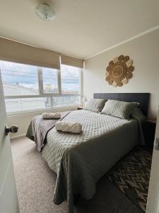 En eller flere senge i et værelse på Apart Total 312