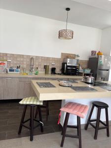 Køkken eller tekøkken på Beach house - Alto Bujama Condominium