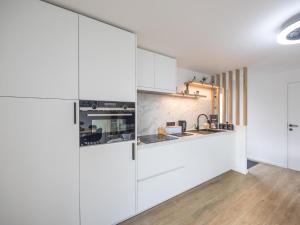 Η κουζίνα ή μικρή κουζίνα στο 't Zand - 2 + park. 2 +6 φωτογραφίες