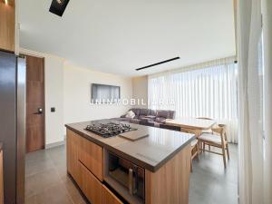 Кухня или мини-кухня в Apartamento de lujo a 3 minutos del Aeropuerto JMC 302
