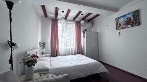 Ένα ή περισσότερα κρεβάτια σε δωμάτιο στο Casa Joy