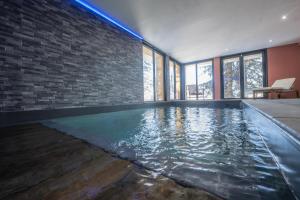 Πισίνα στο ή κοντά στο Chalet avec Piscine La Plagne