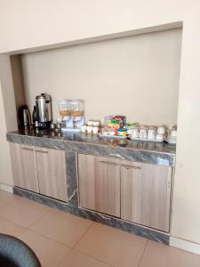 Kuchyň nebo kuchyňský kout v ubytování Savwa Lodges and Apartments