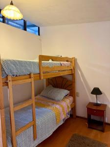 Giường trong phòng chung tại Casa Luz