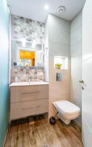 Phòng tắm tại New Gudauri, Loft 1 Apartment +3 ảnh