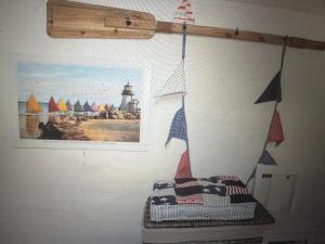 トラフェミュンデにあるKapitänshausの灯台の壁 +22枚の写真