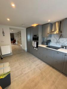 Η κουζίνα ή μικρή κουζίνα στο Bay View +6 φωτογραφίες