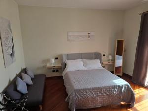 Postel nebo postele na pokoji v ubytování Villa Cristina