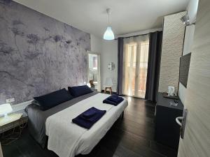 Postel nebo postele na pokoji v ubytování Affittacamere Casa Marconi