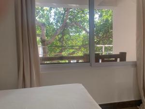 Postel nebo postele na pokoji v ubytování NVH4 Nanay Vacation Home Coron Palawan