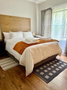 Ένα ή περισσότερα κρεβάτια σε δωμάτιο στο Marie Guest House