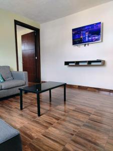 TV a/nebo společenská místnost v ubytování La Casa de Lu cerca de Volcanic park