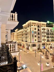 a view of a building at night at BOULEVARD NEST RESlDENCE in Tashkent
