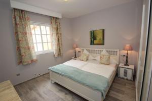 Posteľ alebo postele v izbe v ubytovaní Casa Herrenhaus Finca Montimar