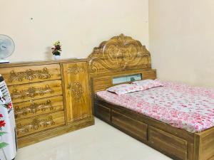 Postel nebo postele na pokoji v ubytování Sreemangal Nest