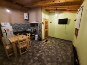 Køkken eller tekøkken på Cabaña Mara + 13 billeder