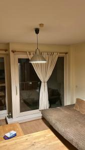 Ένα ή περισσότερα κρεβάτια σε δωμάτιο στο Beautiful studio with terrace in Woluwe-Saint-Lambert