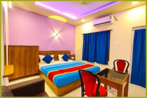 Ένα ή περισσότερα κρεβάτια σε δωμάτιο στο Hotel Miraj Blusagar Jagannath Temple # Sea Beach # Bangali Market, Best Prime Location