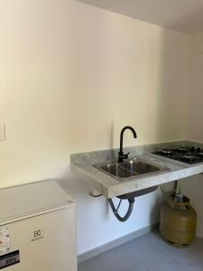 Кухня или мини-кухня в Suíte 6 - Tucano
