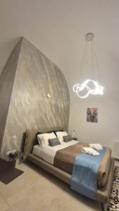 Postel nebo postele na pokoji v ubytování VILLA GENTILE RESORT E SPA