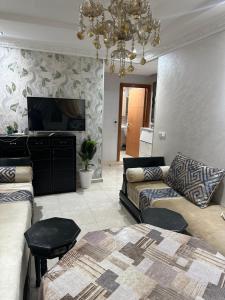 Μια τηλεόραση ή/και κέντρο ψυχαγωγίας στο appart 206