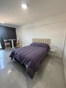 Ένα ή περισσότερα κρεβάτια σε δωμάτιο στο Brickell Rami