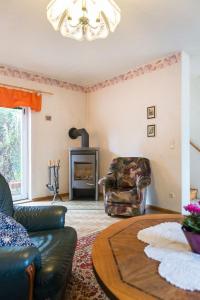 Posezení v ubytování Löwenzahn + 17 fotografií