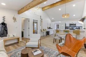 a living room and kitchen with a table and chairs at Gone Fishin in Buckeye Lake