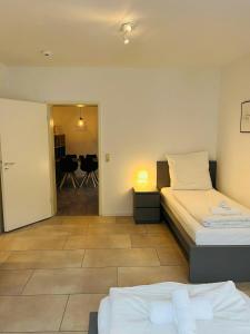 Giường trong phòng chung tại Praktisches 3er-Apartment in Reinbek