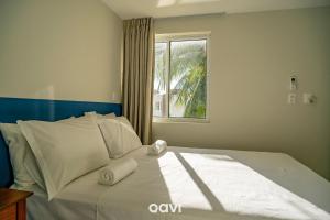 Postel nebo postele na pokoji v ubytování Triplex piscina privativa em Pirangi by Qavi + 22 fotografií