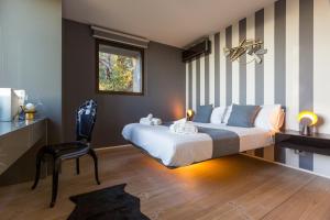 Ένα ή περισσότερα κρεβάτια σε δωμάτιο στο Rahal Luxury - Romantic Getaway Infinity Pool & Private Heated Jacuzzi