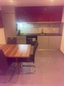 Kuchyň nebo kuchyňský kout v ubytování Le rocher