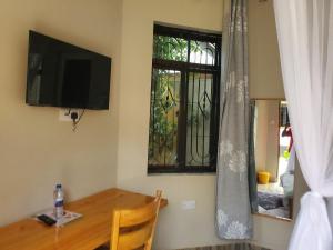 TV a/nebo společenská místnost v ubytování Yvg home of kindness