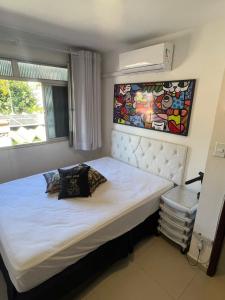 Una cama o camas en una habitación de QUARTO CASAL conforto