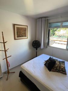 Una cama o camas en una habitación de QUARTO CASAL conforto