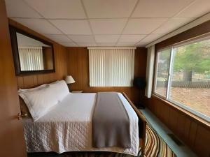 Postel nebo postele na pokoji v ubytování The Ladybug House