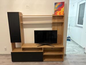 TV a/nebo společenská místnost v ubytování Kian Apartment