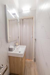 Koupelna v ubytování StayCentral Trikala + 33 fotografií