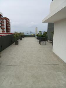 Balkón nebo terasa v ubytování Departamento estudio con estacionamiento